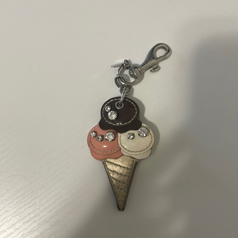 Coach charm